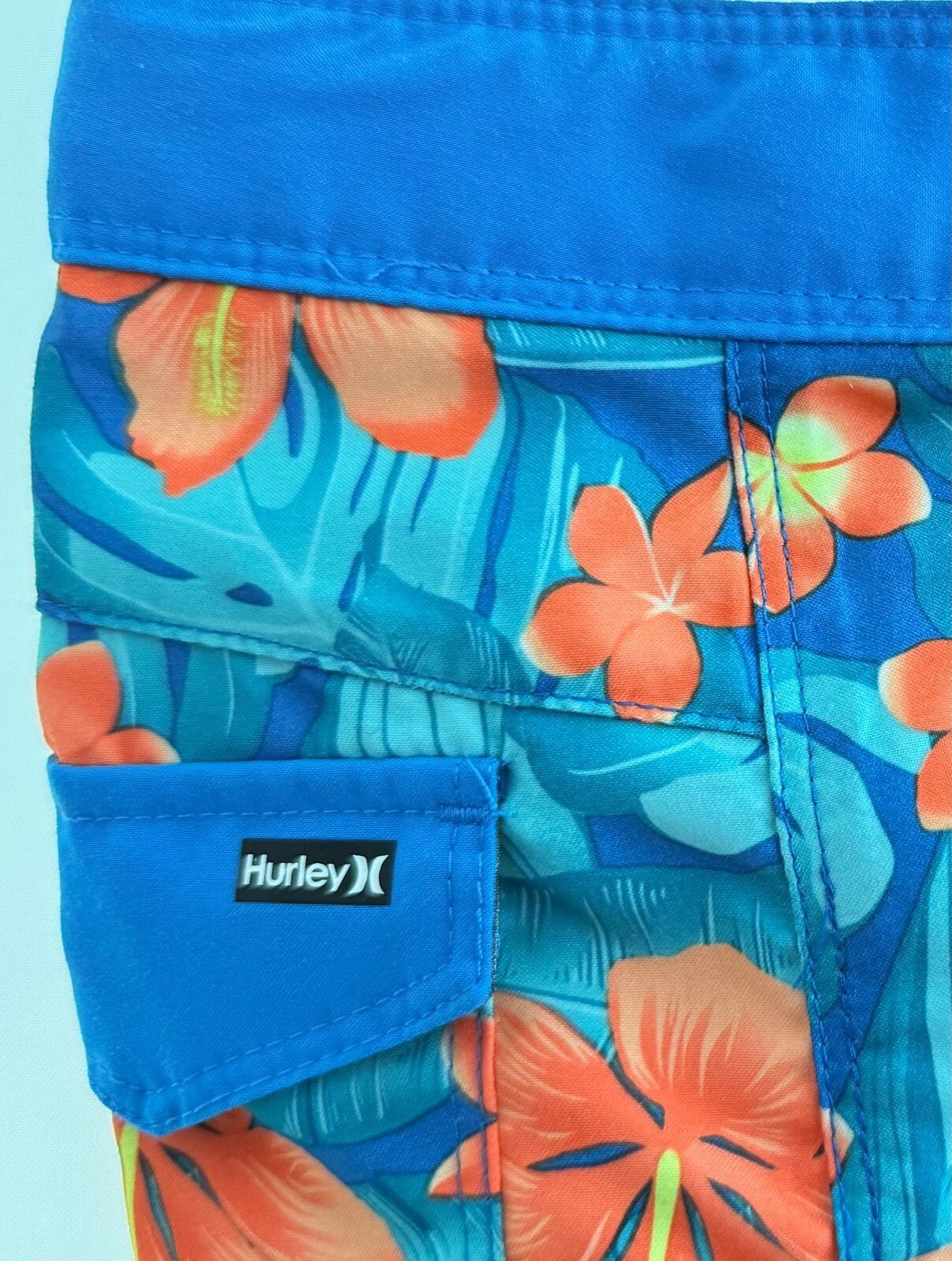 Boys Swim Shorts, Blue, Hawaiian style floral. by Hurley Size 4 - SkyWaves